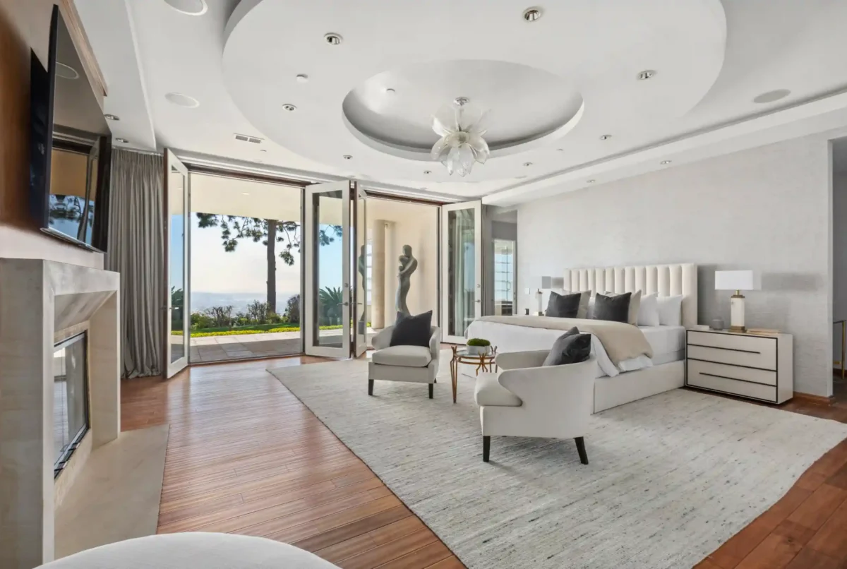 Primary bedroom suite opening onto an ocean-view terrace